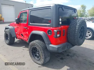 2019 Jeep Wrangler Sport S z VIN 1C4GJXAG4KW652569, wystawiony jako IAAI lot #42116457 z przebiegiem 46 007 mil mil oraz . Historia ofert i sprzedaży dostępna na DreamBid. Obrazek 3.