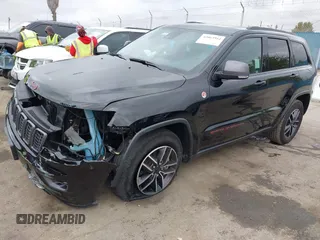 2021 Jeep Grand Cherokee Trailhawk with VIN 1C4RJFLT4MC771773, listed as a IAAI auction lot 42063954 with 17,920 mi miles and . Bid and sale history available at DreamBid. Image 2.