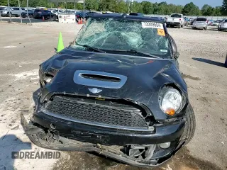 2012 MINI Convertible S with VIN WMWZP3C54CT296796, listed as a Copart auction lot 72209604 with 90,864 mi miles and Salvage title. Bid and sale history available at DreamBid. Image 11.