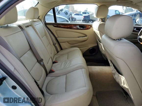 2005 Jaguar XJ with VIN SAJWA79C15SG47018, listed as a Copart auction lot 43087185 with 31,725 mi miles and Salvage Title. Bid and sale history available at carsss.com. Image 10.
