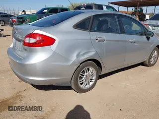 2011 Ford Fiesta SE with VIN 3FADP4BJ4BM177814, listed as a IAAI auction lot 41694964 with 180,565 mi miles. Bid and sale history available at carsss.com. Image 4.