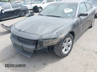 2018 Dodge Charger SXT with VIN 2C3CDXBGXJH180271, listed as a IAAI auction lot 42071701 with 129,325 mi miles and . Bid and sale history available at DreamBid. Image 6.