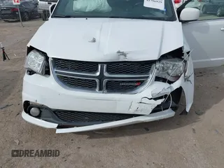 2018 Dodge Grand Caravan SXT with VIN 2C4RDGCG2JR283490, listed as a IAAI auction lot 41796929 with 157,836 mi miles and . Bid and sale history available at DreamBid. Image 6.