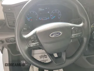 2020 Ford Transit Cargo with VIN 1FTBR2YG3LKA51867, listed as a IAAI auction lot 42787593 with 89,403 mi miles and . Bid and sale history available at DreamBid. Image 21.
