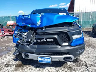 2022 Ram 1500 Rebel z VIN 1C6SRFLT0NN177124, wystawiony jako IAAI lot #41575076 z przebiegiem 40 065 mil mil oraz . Historia ofert i sprzedaży dostępna na DreamBid. Obrazek 12.