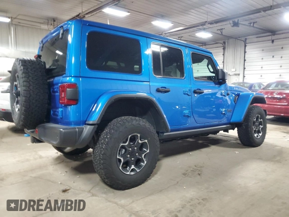 2022 Jeep Wrangler Unlimited Rubicon with VIN 1C4JJXR69NW190564, listed as a Copart auction lot 83703504 with 16,803 mi miles and Salvage title. Bid and sale history available at DreamBid. Image 3.