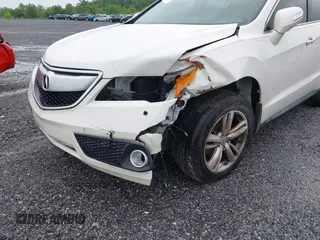 2013 Acura RDX Technology with VIN 5J8TB3H51DL017551, listed as a IAAI auction lot 41464240 with 122,863 mi miles and . Bid and sale history available at DreamBid. Image 6.