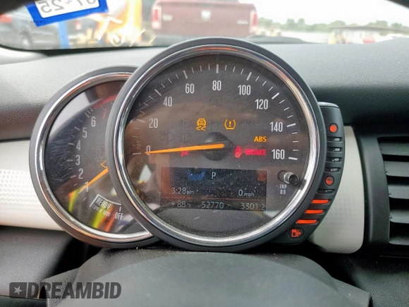 2015 MINI Hardtop 4 Door with VIN WMWXS5C51FT831167, listed as a Copart auction lot 52778685 with 52,770 mi miles and Salvage title. Bid and sale history available at DreamBid. Image 9.