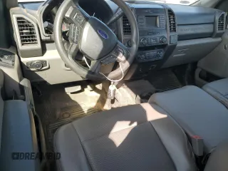 2019 Ford F-250 XL with VIN 1FT7X2B61KEG32082, listed as a Copart auction lot 49965105 with 104,658 mi miles and Salvage Title. Bid and sale history available at DreamBid. Image 8.