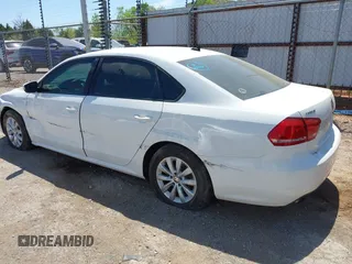 2015 Volkswagen Passat Wolfsburg Edition with VIN 1VWAT7A33FC047606, listed as a IAAI auction lot 42034665 with 165,233 mi miles and . Bid and sale history available at DreamBid. Image 3.