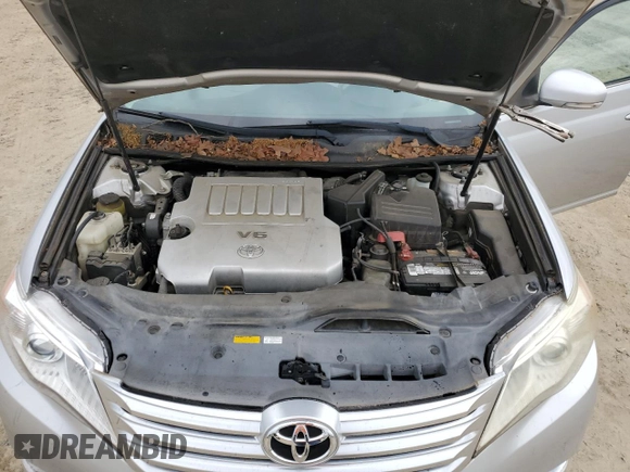 2012 Toyota Avalon z VIN 4T1BK3DBXCU454457, wystawiony jako Copart lot #57153835 z przebiegiem 128 064 mil mil oraz Szkoda całkowita • Salvage title. Historia ofert i sprzedaży dostępna na DreamBid. Obrazek 11.