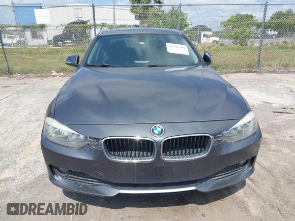 2013 BMW 3 Series 320i with VIN WBA3B1C5XDF462859, listed as a IAAI auction lot 42191369 with 140,253 mi miles and . Bid and sale history available at carsss.com. Image 6.