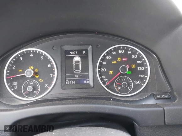 2013 Volkswagen Tiguan S with VIN WVGAV3AX0DW572915, listed as a IAAI auction lot 41937763 with 65,136 mi miles and . Bid and sale history available at DreamBid. Image 7.