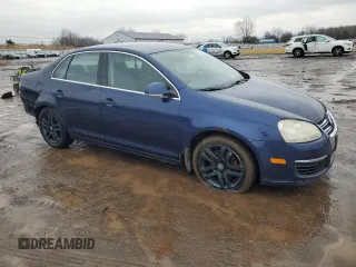 2006 Volkswagen Jetta z VIN 3VWRG81K06M785950, wystawiony jako Copart lot #87218214 z przebiegiem 129 955 mil mil oraz Szkoda całkowita • Salvage title. Historia ofert i sprzedaży dostępna na DreamBid. Obrazek 4.