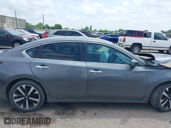 2018 Nissan Altima SR with VIN 1N4AL3AP2JC229312, listed as a IAAI auction lot 42099101 with 106,408 mi miles and . Bid and sale history available at carsss.com. Image 14.
