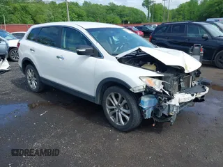 2013 Mazda CX-9 Grand Touring with VIN JM3TB3DV1D0409698, listed as a IAAI auction lot 42273758 with 58,865 mi miles and . Bid and sale history available at DreamBid. Image 1.