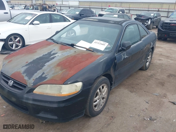 2001 Honda Accord Cpe EX w/Leather with VIN 1HGCG22561A014950, listed as a IAAI auction lot 41312685 with 194,967 mi miles. Bid and sale history available at carsss.com. Image 17.