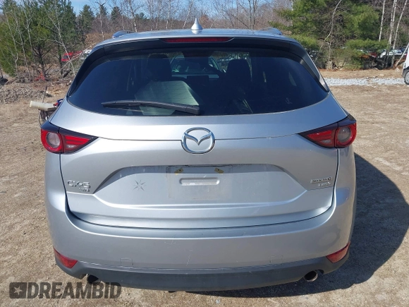 2021 Mazda CX-5 Grand Touring Reserve with VIN JM3KFBAY5M0472988, listed as a IAAI auction lot 41897855 with 27,318 mi miles. Bid and sale history available at carsss.com. Image 17.