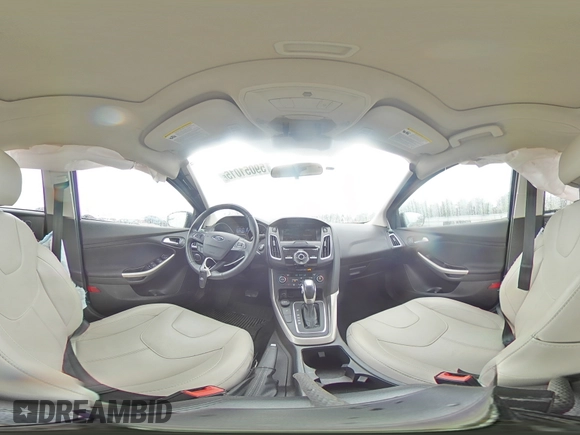2018 Ford Focus Titanium z VIN 1FADP3N21JL295883, wystawiony jako Copart lot #59051015 z przebiegiem 43 284 mil mil oraz Szkoda całkowita • Salvage title. Historia ofert i sprzedaży dostępna na DreamBid. Obrazek 14.