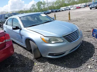 2014 Chrysler 200 Limited with VIN 1C3CCBCG5EN185590, listed as a IAAI auction lot 42176958 with 137,084 mi miles and . Bid and sale history available at DreamBid. Image 1.