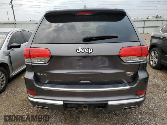 2014 Jeep Grand Cherokee Summit с VIN 1C4RJFJG6EC500348, выставлен на аукционе Copart как лот 59166275 с пробегом 104 623 миль миль и Списание • Salvage title. История ставок и продаж доступна на DreamBid. Изображение 6.
