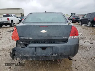 2014 Chevrolet Impala LTZ with VIN 2G1WC5E32E1110490, listed as a Copart auction lot 51873165 with 162,790 mi miles and Salvage Title. Bid and sale history available at DreamBid. Image 6.