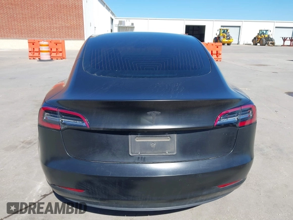 2020 Tesla Model 3 Standard Range Plus with VIN 5YJ3E1EA0LF597761, listed as a IAAI auction lot 41773918 with 89,957 mi miles. Bid and sale history available at carsss.com. Image 15.