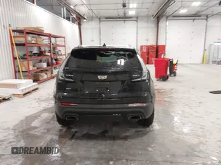 2020 Cadillac XT4 AWD Sport with VIN 1GYFZFR43LF090264, listed as a IAAI auction lot 41261586 with 65,859 mi miles and . Bid and sale history available at DreamBid. Image 16.