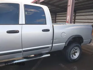2005 Dodge 3500 SLT z VIN 3D7LS38C15G791333, wystawiony jako IAAI lot #40892553 z przebiegiem 188 933 mil mil oraz . Historia ofert i sprzedaży dostępna na DreamBid. Obrazek 6.