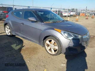 2013 Hyundai Veloster RE:MIX with VIN KMHTC6AD4DU132813, listed as a IAAI auction lot 41372179 with 168,939 mi miles and . Bid and sale history available at DreamBid. Image 1.