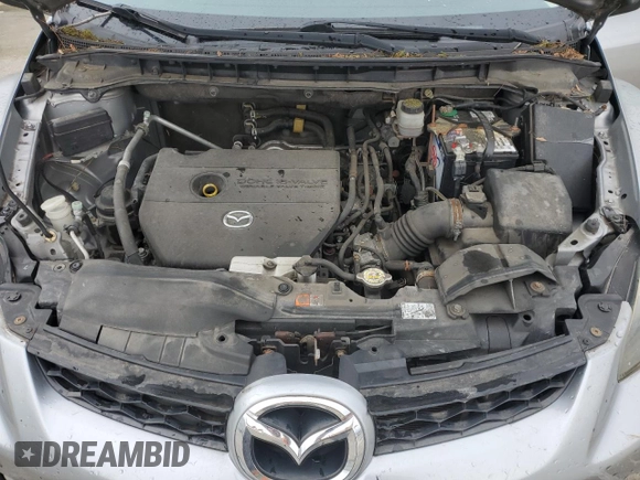 2012 Mazda CX-7 i Sport z VIN JM3ER2B53C0416250, wystawiony jako Copart lot #47869625 z przebiegiem 145 067 mil mil oraz Szkoda całkowita • Salvage title. Historia ofert i sprzedaży dostępna na DreamBid. Obrazek 12.