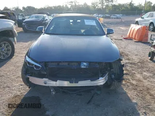 2020 BMW 2 Series 230i xDrive with VIN WBA2K1C08L7G28887, listed as a IAAI auction lot 42122785 with 30,599 mi miles and . Bid and sale history available at carsss.com. Image 12.