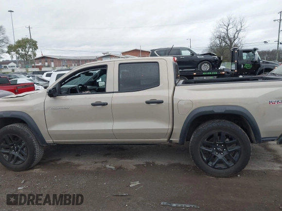 2023 Chevrolet Colorado 4WD Trail Boss with VIN 1GCPTEEK8P1239877, listed as a IAAI auction lot 40893691 with 30,617 mi miles. Bid and sale history available at carsss.com. Image 14.