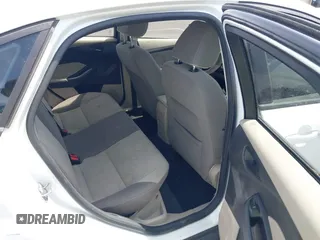 2012 Ford Focus SE with VIN 1FAHP3F24CL462319, listed as a IAAI auction lot 41981509 with 124,831 mi miles. Bid and sale history available at carsss.com. Image 8.