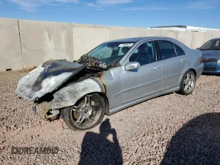 2005 Mercedes-Benz C 55 AMG with VIN WDBRF76J75F615890, listed as a Copart auction lot 77400624 with 119,963 mi miles and Salvage title. Bid and sale history available at DreamBid. Image 1.