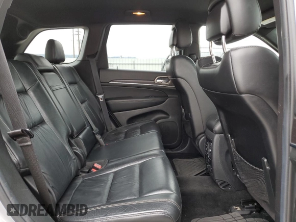 2014 Jeep Grand Cherokee Limited z VIN 1C4RJFBG0EC378830, wystawiony jako Copart lot #58778625 z przebiegiem 124 143 mil mil oraz Czysty tytuł • Clean title. Historia ofert i sprzedaży dostępna na DreamBid. Obrazek 11.