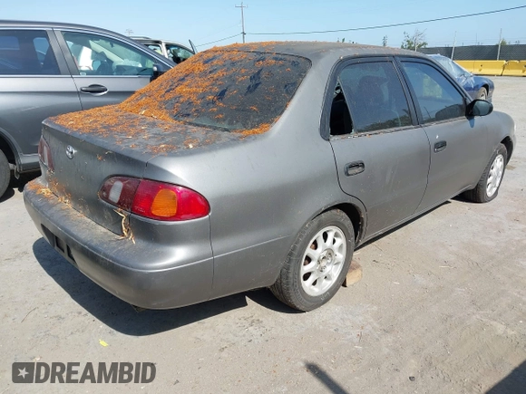 1999 Toyota Corolla VE z VIN 1NXBR12E5XZ237045, wystawiony jako IAAI lot #42413586 z przebiegiem Nie podano mil oraz . Historia ofert i sprzedaży dostępna na DreamBid. Obrazek 4.