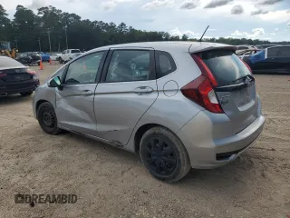 2020 Honda Fit LX with VIN 3HGGK5H49LM705119, listed as a Copart auction lot 62199585 with 87,007 mi miles and Salvage title. Bid and sale history available at DreamBid. Image 2.