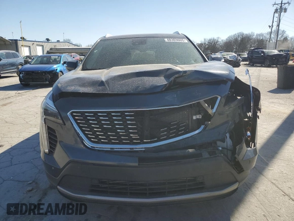 2021 Cadillac XT4 AWD Premium Luxury with VIN 1GYFZDR47MF002175, listed as a Copart auction lot 48303665 with 94,698 mi miles and Salvage Title. Bid and sale history available at carsss.com. Image 5.