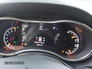 2020 Jeep Grand Cherokee Laredo E with VIN 1C4RJEAG7LC324904, listed as a IAAI auction lot 42600961 with 93,444 mi miles and . Bid and sale history available at DreamBid. Image 7.