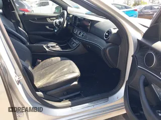 2018 Mercedes-Benz E-Class E 300 with VIN WDDZF4JB0JA472648, listed as a IAAI auction lot 41843995 with 128,590 mi miles. Bid and sale history available at carsss.com. Image 5.