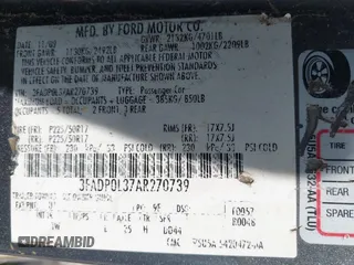 2010 Ford Fusion Hybrid with VIN 3FADP0L37AR270739, listed as a IAAI auction lot 42143035 with 238,111 mi miles. Bid and sale history available at carsss.com. Image 9.