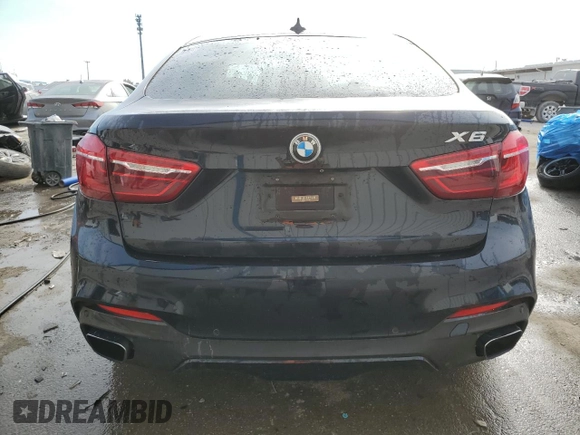 2015 BMW X6 xDrive50i with VIN 5UXKU6C56F0F93641, listed as a Copart auction lot 77233553 with 71,409 mi miles. Bid and sale history available at carsss.com. Image 6.