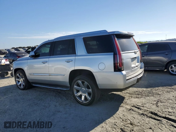 2020 Cadillac Escalade Luxury z VIN 1GYS4BKJ2LR127115, wystawiony jako Copart lot #70709034 z przebiegiem 88 210 mil mil oraz Szkoda całkowita • Salvage title. Historia ofert i sprzedaży dostępna na DreamBid. Obrazek 2.