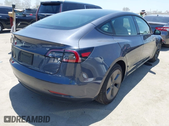2023 Tesla Model 3 with VIN 5YJ3E1EA1PF545402, listed as a IAAI auction lot 42671354 with 37,948 mi miles and . Bid and sale history available at DreamBid. Image 4.