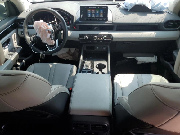 2023 Honda Pilot Touring with VIN 5FNYG2H77PB014212, listed as a Copart auction lot 59222715 with 4,507 mi miles and Salvage title. Bid and sale history available at DreamBid. Image 8.