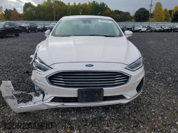 2020 Ford Fusion Hybrid SEL with VIN 3FA6P0MU8LR189560, listed as a Copart auction lot 76598364 with 57,443 mi miles and Salvage Title. Bid and sale history available at carsss.com. Image 5.
