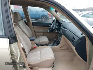 2003 Subaru Forester XS with VIN JF1SG65663H753306, listed as a IAAI auction lot 41311689 with 253,269 mi miles. Bid and sale history available at carsss.com. Image 5.