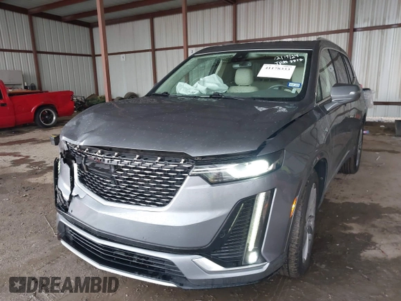 2022 Cadillac XT6 Premium Luxury z VIN 1GYKPDRS1NZ108012, wystawiony jako IAAI lot #41178333 z przebiegiem 83 987 mil mil oraz . Historia ofert i sprzedaży dostępna na DreamBid. Obrazek 2.