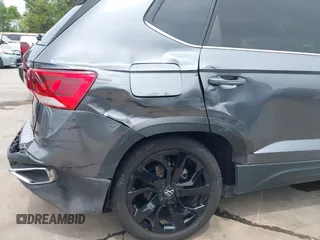 2022 Volkswagen Taos SE z VIN 3VVSX7B2XNM062037, wystawiony jako IAAI lot #42051064 z przebiegiem 30 149 mil mil oraz . Historia ofert i sprzedaży dostępna na DreamBid. Obrazek 6.